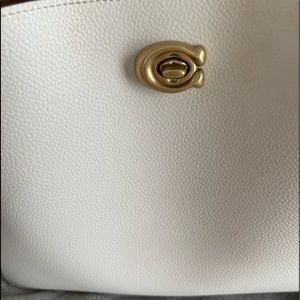 Like new Coach bag in color block. White with beige strap